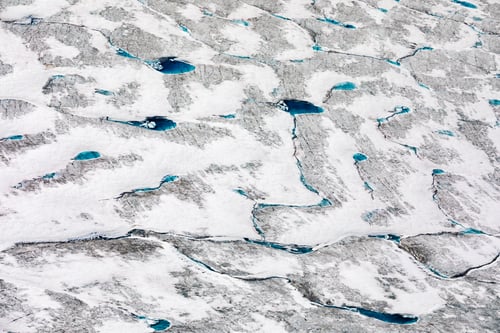 Preview: Thawing glacier surface aerial ice texture pattern