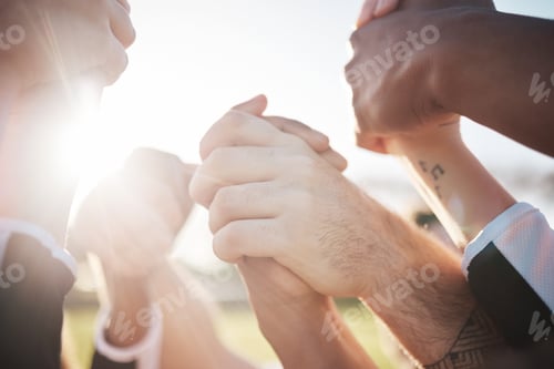 Preview: Holding hands in air, solidarity and support in team, group of people outdoor with sunshine, lens f