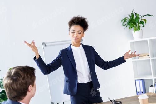 Preview: portrait of african american businesswoman having conference with colleague