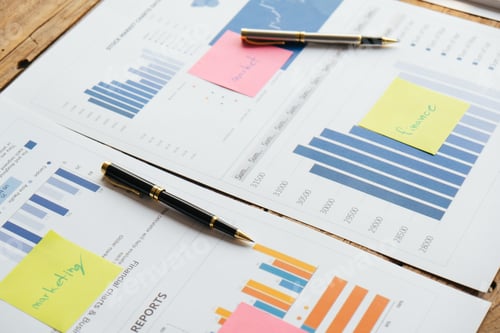 Preview: Cropped shot of business graph and chart document on the table. Business concept.