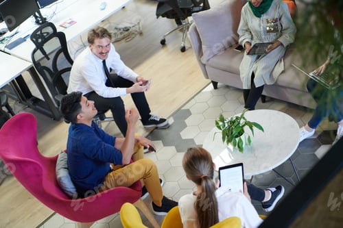 Preview: Multiethnic startup business team having team building