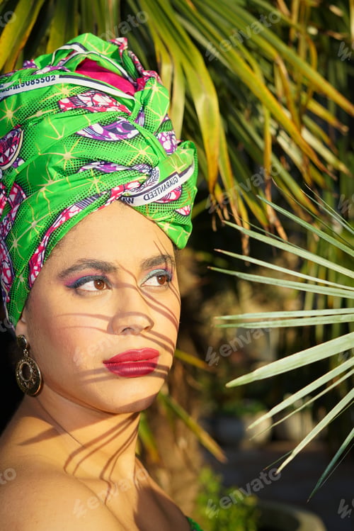 Woman in Green Headwrap and Red Lipstick