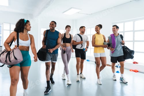 Preview: Happy athletes leaving gym after functional training workout