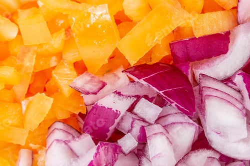 Preview: High angle closeup shot of small pieces of onion and bell pepper
