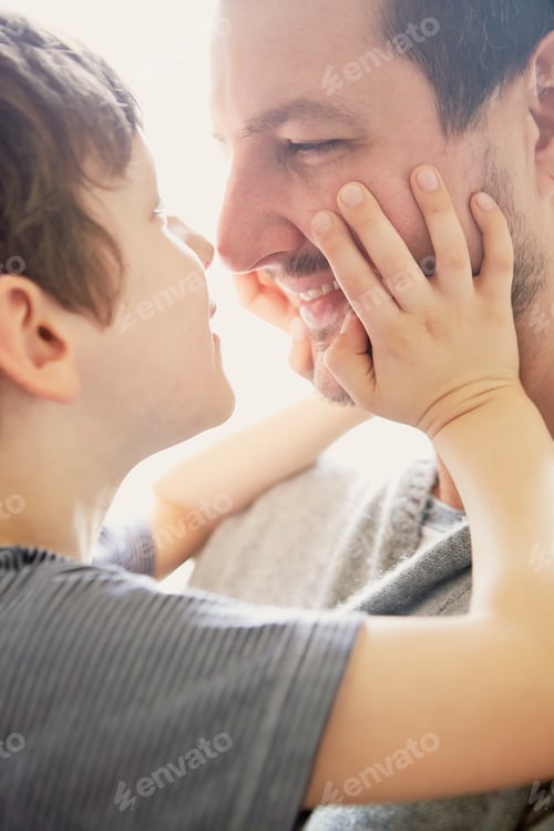 Preview: Boy showing affection to father