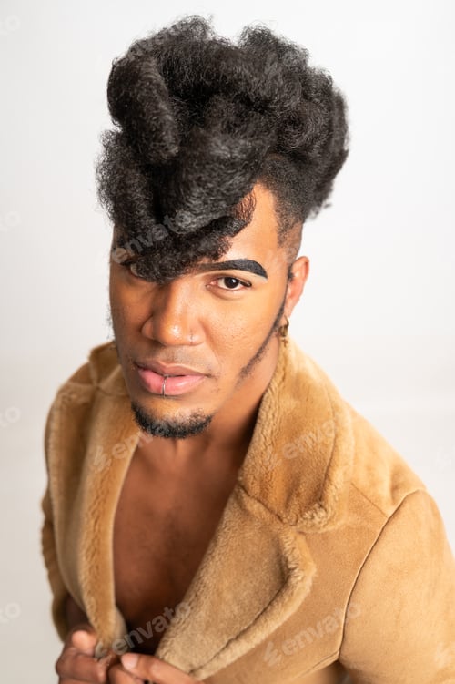 Preview: Stylish model posing with trendy hairstyle and fashionable fur coat