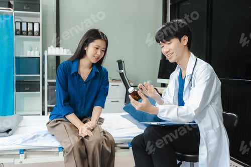 Preview: Doctor giving explanation about medicine to patient in hospital.