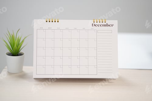 Vista previa: Calendario de escritorio para diciembre sobre la mesa con espacio para copiar en el concepto de espacio de trabajo.