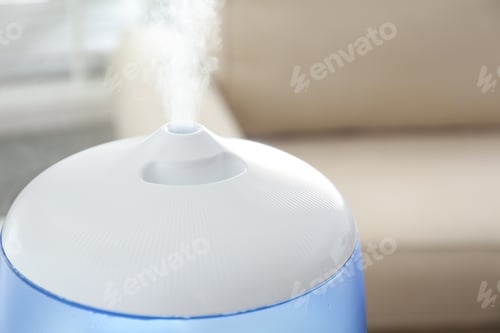 Preview: Modern air humidifier at home, closeup view