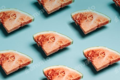 Preview: Slices of watermelon on pastel blue background top view mock up minimal with copy