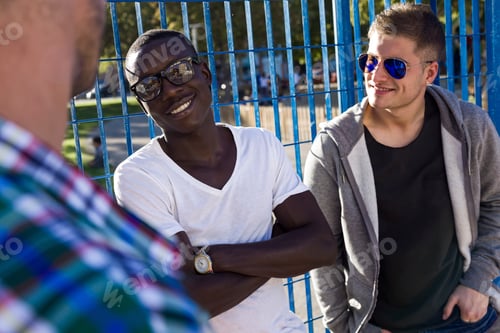 Preview: Group of friends talking after playing basketball.