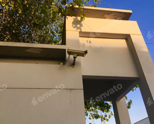 Security Camera Installed on Outside of Building Wall