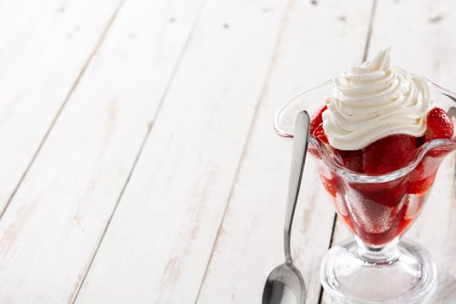 Preview: Strawberries and whipped cream in ice cream glass