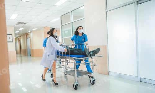 Preview: Emergency department, doctors and surgeons team move seriously injured patient lying
