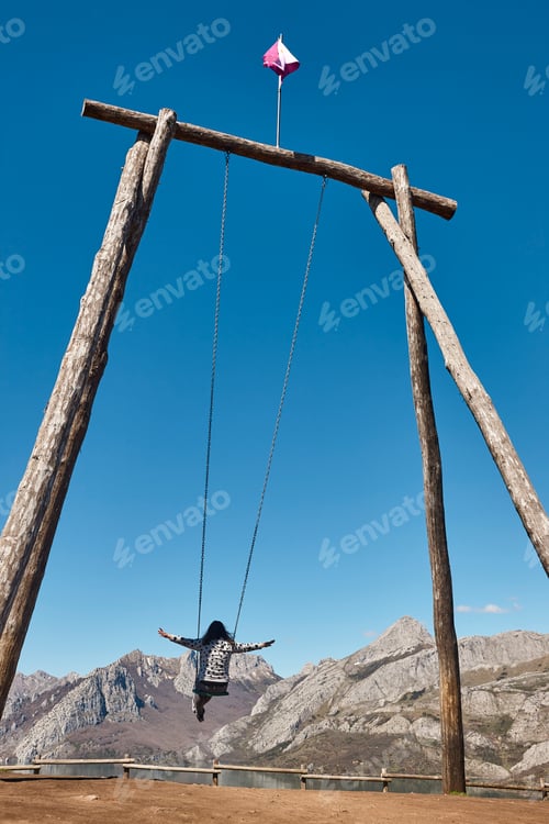 Preview: Famous huge swing surrounded by mountains in Riano village. Spain