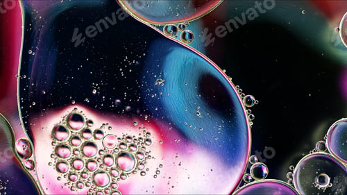 Preview: Abstract Colorful Food Oil Drops Bubbles and spheres Flowing on Water Surface