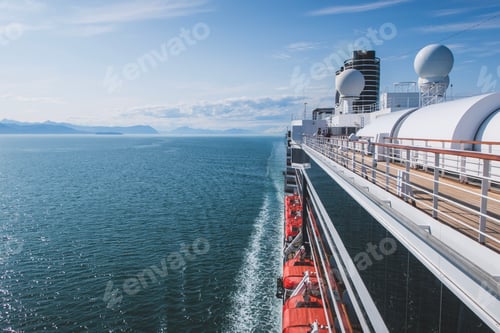 Preview: View from a cruise ship on starboard side, sea and mountains in background