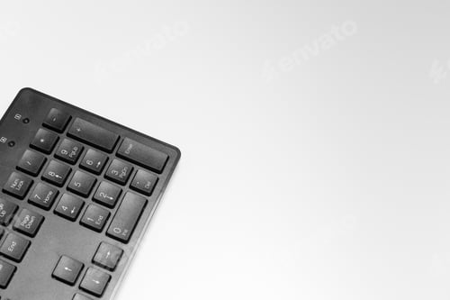Preview: Black computer keyboard on a white table background close up