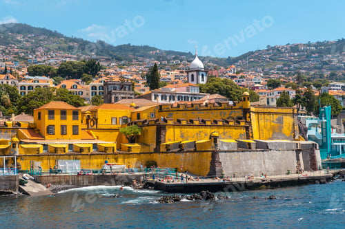 Preview: View of the seaside yellow fort of Forte de Sao Tiago on Funchal beach in summer. Madeira
