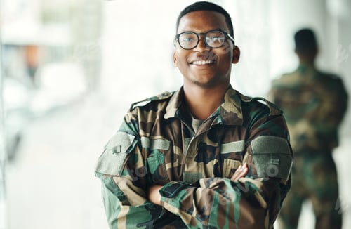 Preview: Confident soldier portrait, smile and arms crossed in army building, pride and professional hero se