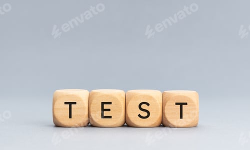 Preview: Test word on wood cube blocks on gray background