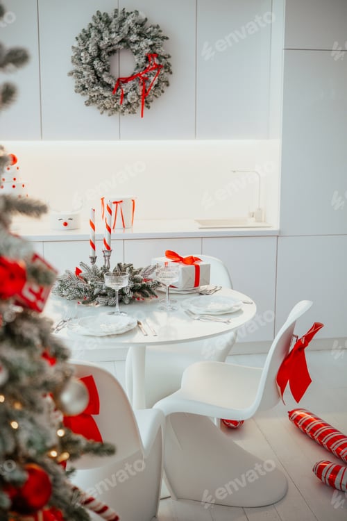Preview: festive table setting with holiday decor and christmas tree celebration