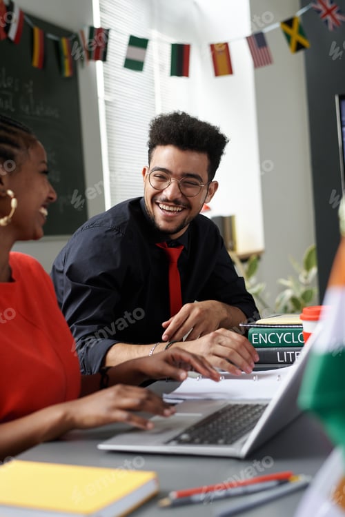 Preview: Students working on laptop in team