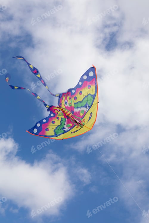 Preview: Low angle view of kite flying in sky