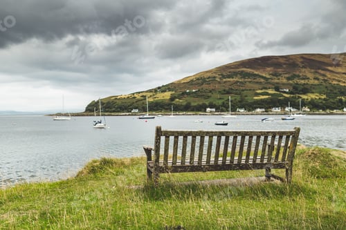 Preview: Close-up bench on the Scottish shore. The bayview