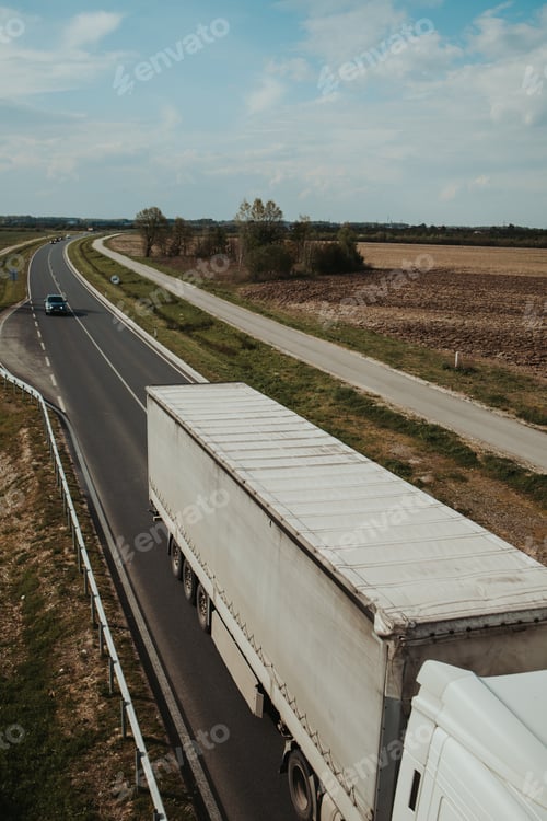 Preview: White truck on a highway