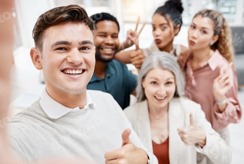 Preview: Group of cheerful diverse businesspeople taking a selfie together at work. Happy caucasian business