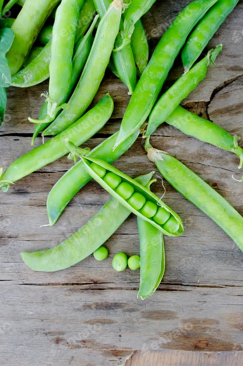 Preview: Pods of young green peas and pea