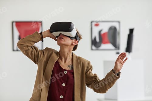 Preview: Young Woman Wearing VR in Museum of Modern Art