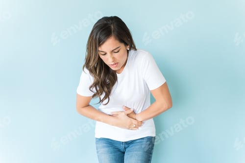 Preview: Female Suffering From Stomachache Isolated Over Background