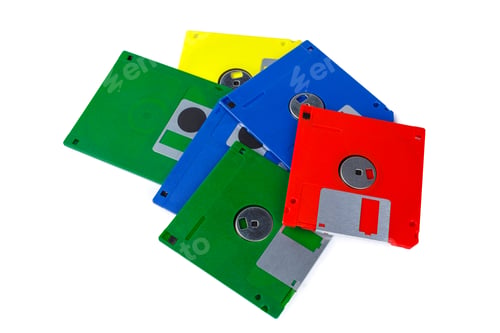 Preview: Colorful floppy disks arranged on a white background for vintage tech display