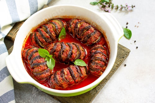 Preview: Thanksgiving day food concept. Homemade Baked eggplants stuffed with turkey meat in tomato sauce.