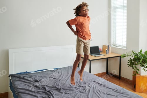 Preview: Kid Jumping on Bed