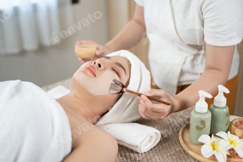 Preview: Young Asian beauty woman enjoying massage and spa.