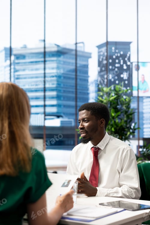 Preview: Headhunter negotiating salary package and other benefits with smiling applicant
