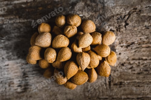 Preview: Almonds in shell on a Wooden Table