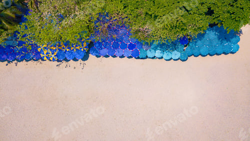 Preview: Aerial view of umbrellas, beach, and sea in summer day for travel or holiday background