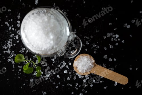 Preview: wooden spoon filled with sea salt