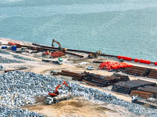 Preview: Construction progress on shipping port terminal through land reclamation. Global trade development