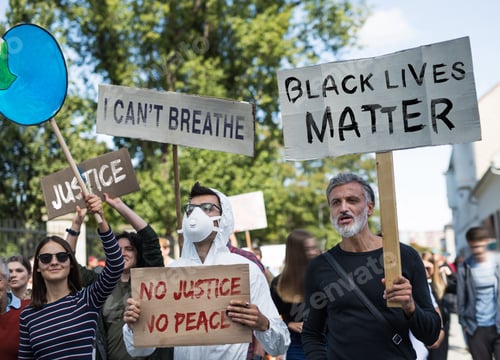 Preview: Black lives matters protesters holding signs and marching outdoors in streets