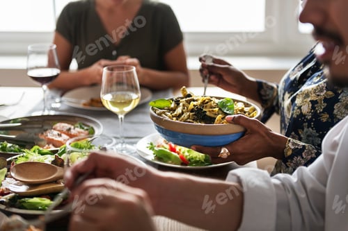 Preview: Friends gathering having Italian food together