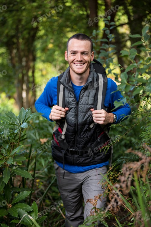 Preview: Man Hiking Through A Forest In The Countryside