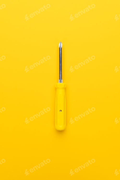Preview: Screwdriver on Yellow Background