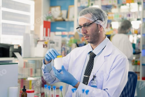 Preview: Scientist holding medical product for doing research and experiment