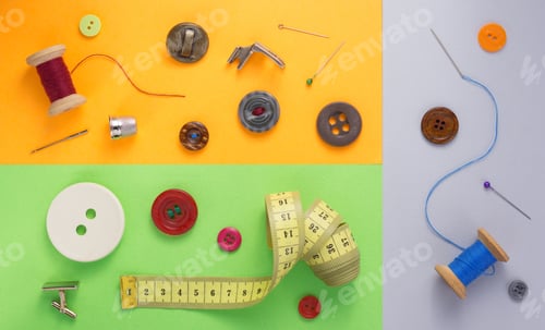 Preview: sewing tools and accessories at paper background
