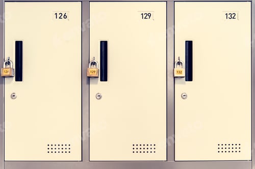 Preview: Locked white lockers with padlocks